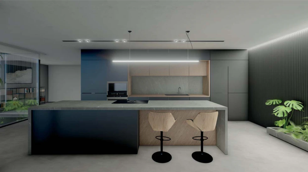 Cocina de diseño con isla central en villa de obra nueva en El Faro, Cullera.